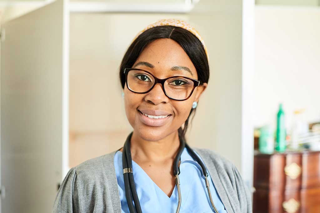 Healthcare professional smiling at the camera