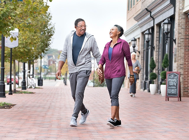 Happy couple walking outdoors