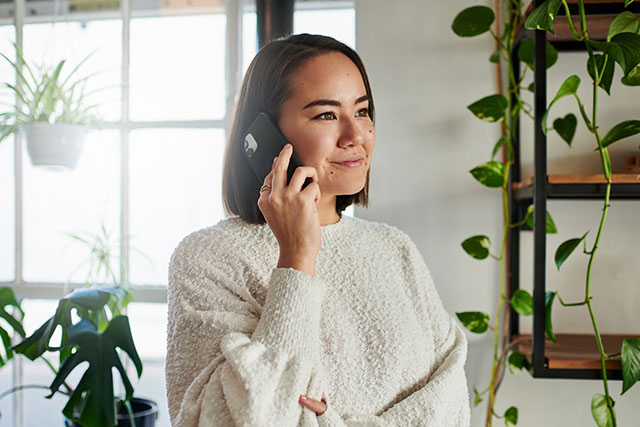 Contact Us - Woman on phone