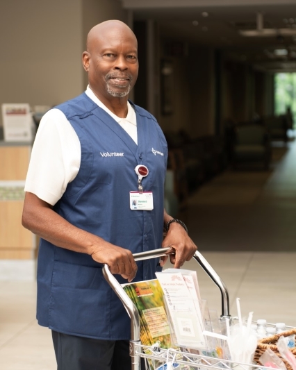 Thirkield Marbury pushing volunteer cart