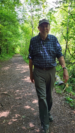 Bob walking in the woods