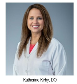 Dr. Kirby in a lab coat